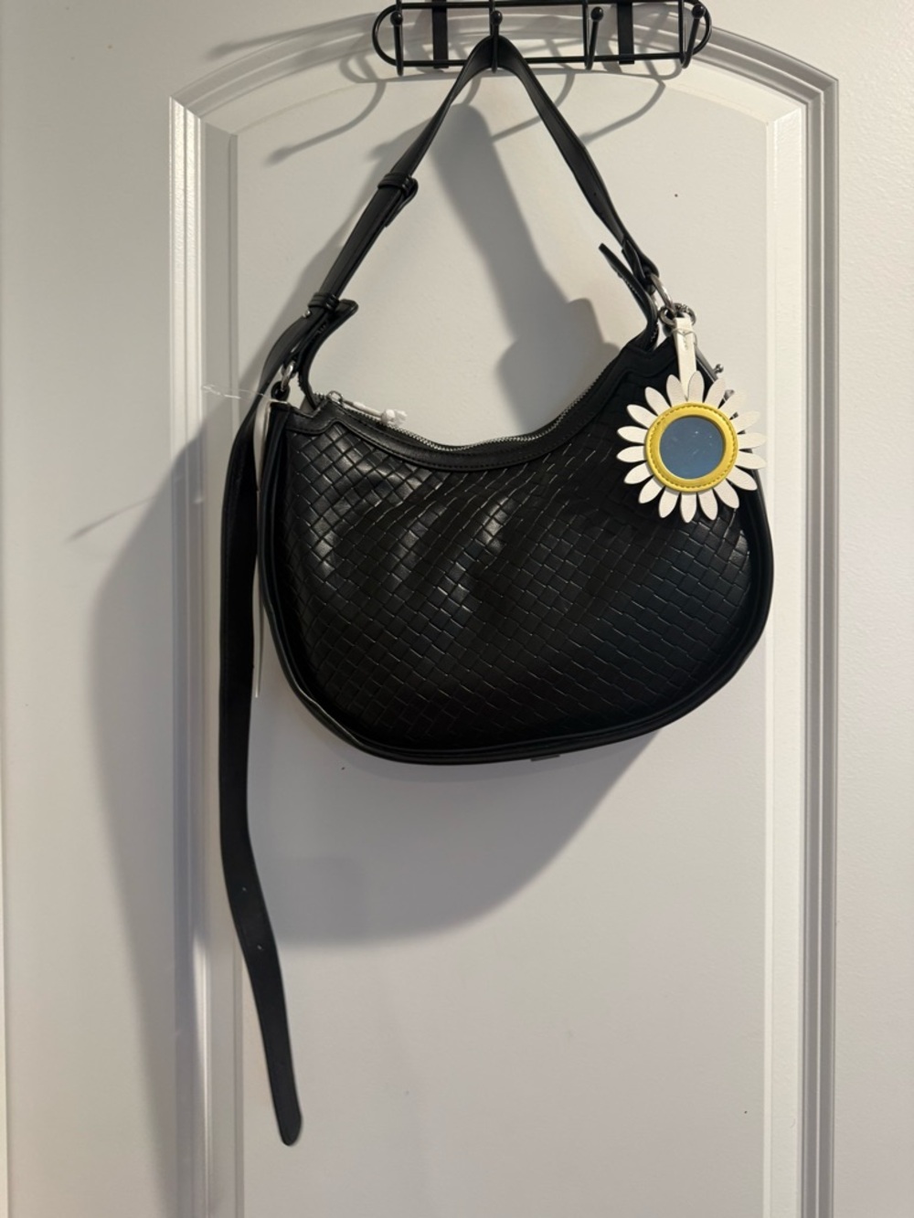 Black Woven Shoulder Bag with Daisy Charm